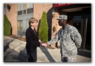 Martha Coakley and soldier in Lowell